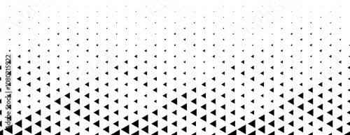 Geometric pattern of black triangles on a white background.Seamless in one direction.Option with an average fade out.Scale method.