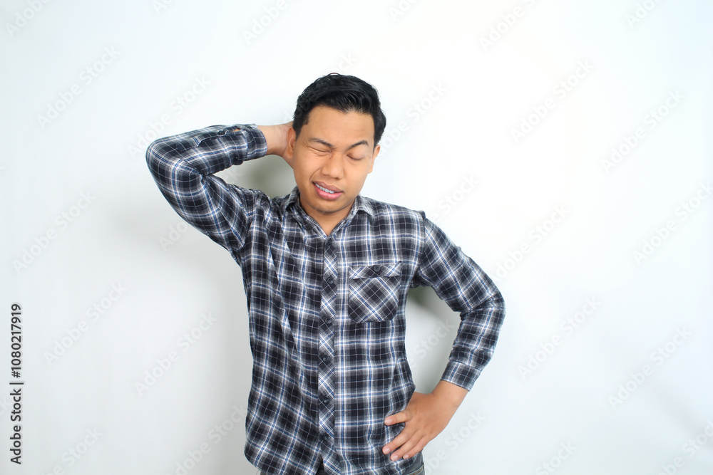 unhealthy asian man feel migraine and fatigue isolated on white wearing casual shirt unhealthy asian man feel migraine and fatigue isolated on white wearing casual shirt