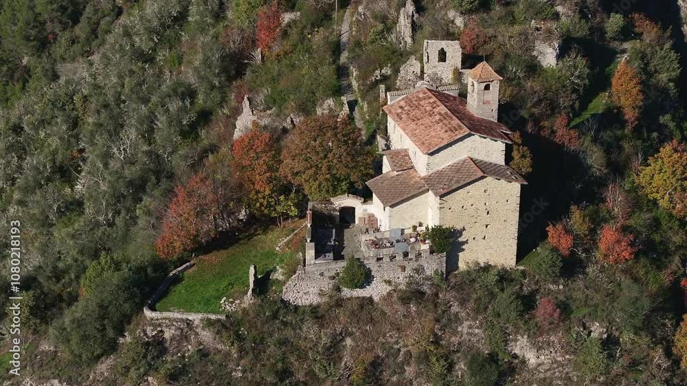 Drone view of the Saint-Pierre church in the old village of Tournefort Drone view of the Saint-Pierre church in the old village of Tournefort