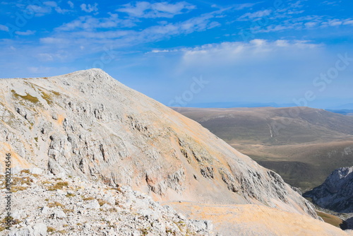 Mount Oshten peak with a steep slope