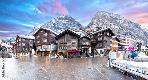 Idyllic mountain village of Zermatt square panoramic view, luxury Alpine winter destination