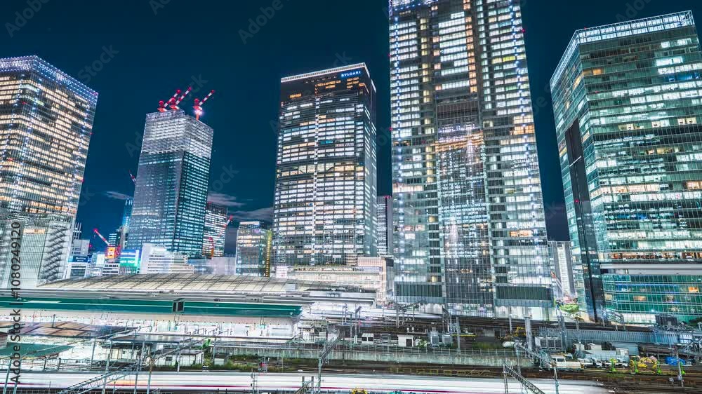 【東京都・中央区】東京駅の都市夜景 八重洲の超高層ビル群と電車の光跡 タイムラプス フィックス
Tokyo city night view. Skyscrapers of Yaesu and light trails of train at Tokyo Station - Japan - Time lapse video - fix 【東京都・中央区】東京駅の都市夜景 八重洲の超高層ビル群と電車の光跡 タイムラプス フィックス
Tokyo city night view. Skyscrapers of Yaesu and light trails of train at Tokyo Station - Japan - Time lapse video - fix
