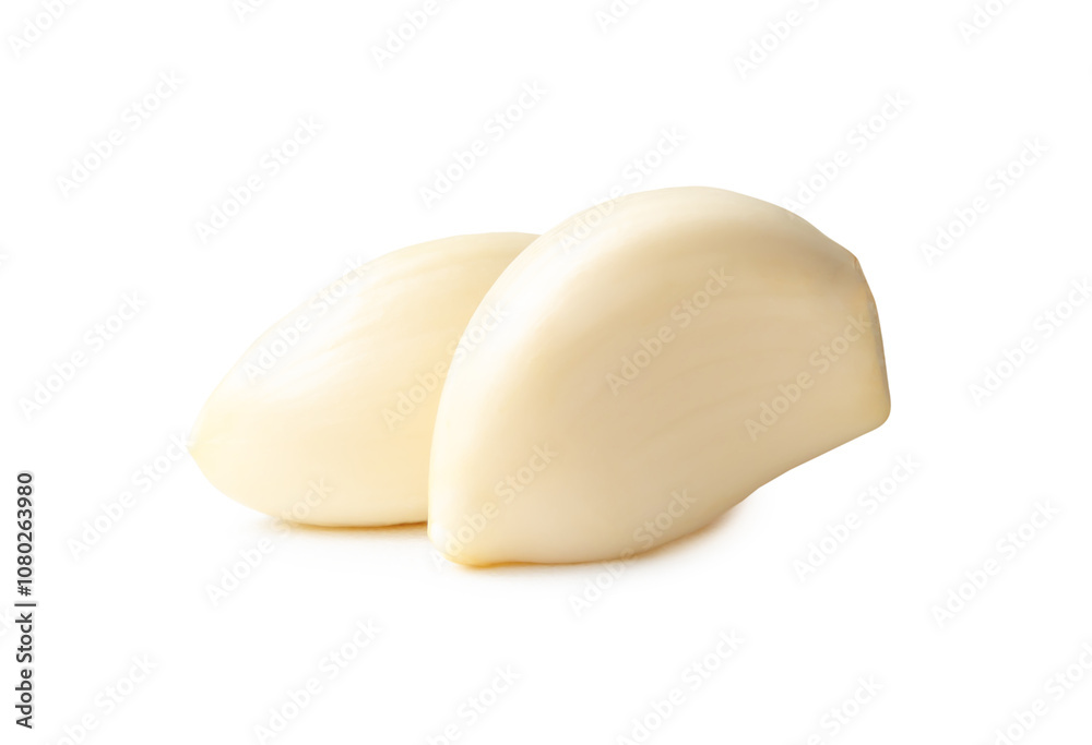 Side view of peeled garlic cloves in stack isolated on white background with clipping path Side view of peeled garlic cloves in stack isolated on white background with clipping path