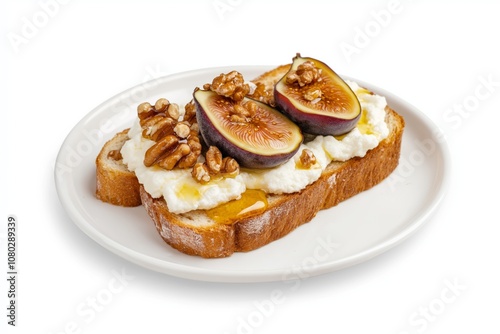 Toast with ricotta, fresh fig slices, walnuts, and honey drizzle on a white plate. Healthy breakfast or snack