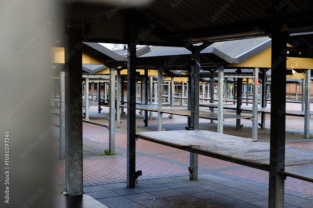 Leeds England: 3rd Jun 2024:Victoria Quarter traditional market stalls, empty no people or shops open