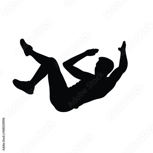 A man is falling down and holding a bottle. He is wearing black shorts and a black shirt