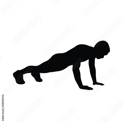 A man is doing a push up on a white background. He is wearing black shorts and a black shirt