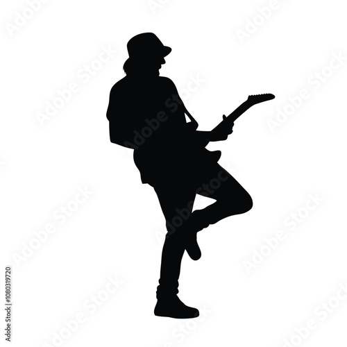 A man playing a saxophone. He is wearing a hat and is bending over. The saxophone is in his right hand