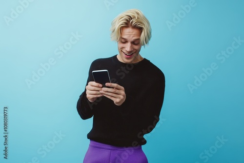 Stylish man smiling while using phone indoors 