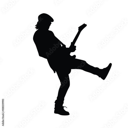 A man playing a saxophone. He is wearing a hat and is bending over. The saxophone is in his right hand