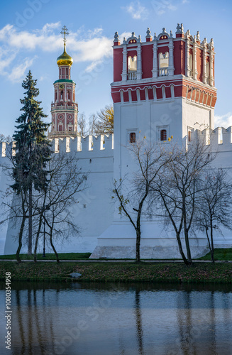 View of the Theotokos-Smolensky Novodevichy Convent of the 16th century in Moscow on an autumn sunny day from the side of Novodevichy Pond