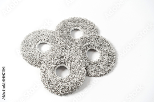 Spare parts for robot vacuum cleaner on a white background. cloths for replacing and repairing the vacuum cleaner.