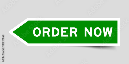 Green color arrow shape sticker label with word order now on gray background