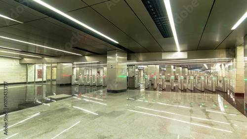 Obraz na plátne Interior of a modern subway station with turnstile timelapse hyperlapse