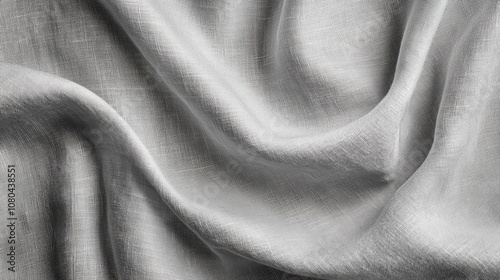 Close-up of soft, textured grey fabric, creating an elegant and serene atmosphere.