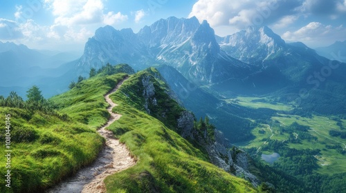 A winding mountain path leads up to a ridge with stunning views of the surrounding peaks, valleys, and fields.