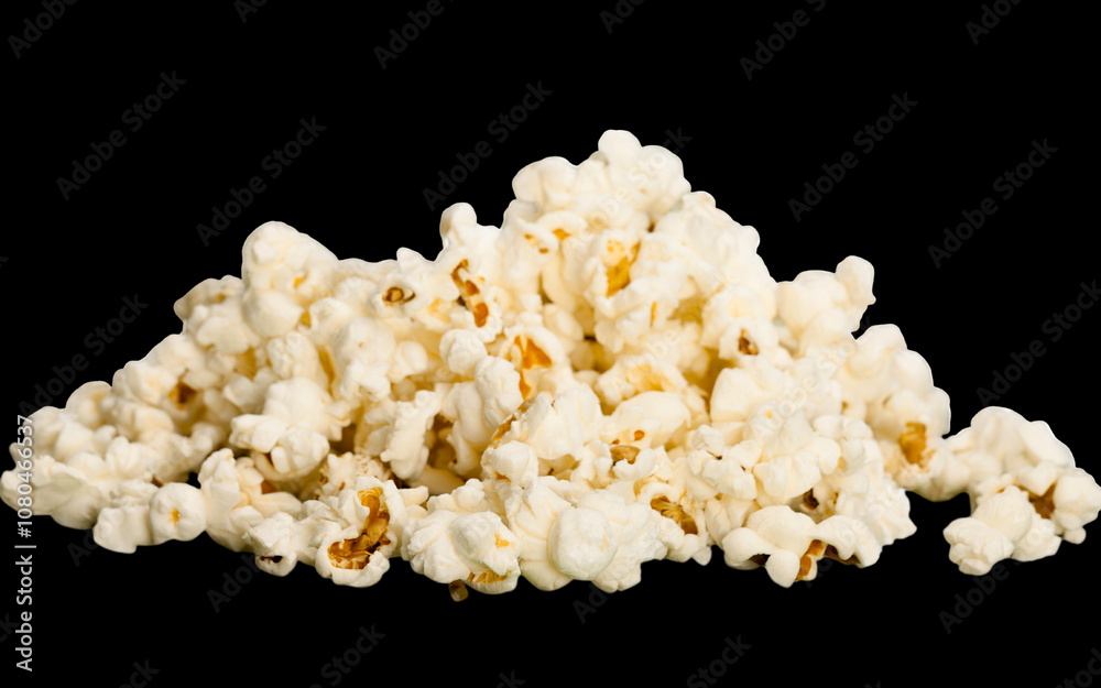 Delicious popcorn flying out of a red-white striped paper cup, cut out