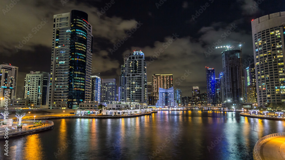 Dubai Marina towers and canal in Dubai night timelapse hyperlapse Dubai Marina towers and canal in Dubai night timelapse hyperlapse