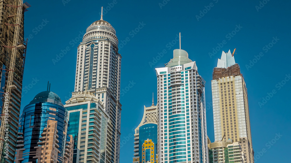 Fototapeta premium Luxurious Residence Buildings timelapse hyperlapse in Dubai Marina, UAE