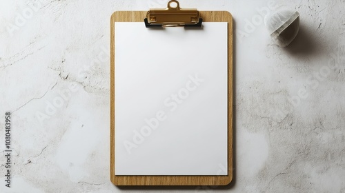 An isolated mockup of a wooden clipboard with blank paper on a light grey background. --ar 16:9 --style raw --stylize 250 --v 6.1 Job ID: 9ddedd4b-b067-4a8e-b363-e17cc2deba6b