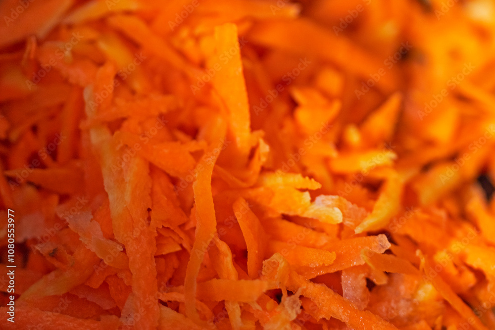 cooking frying half rings of onion with pieces of fresh carrot in a saucepan. Vegetarian nutrition and health cooking frying half rings of onion with pieces of fresh carrot in a saucepan. Vegetarian nutrition and health
