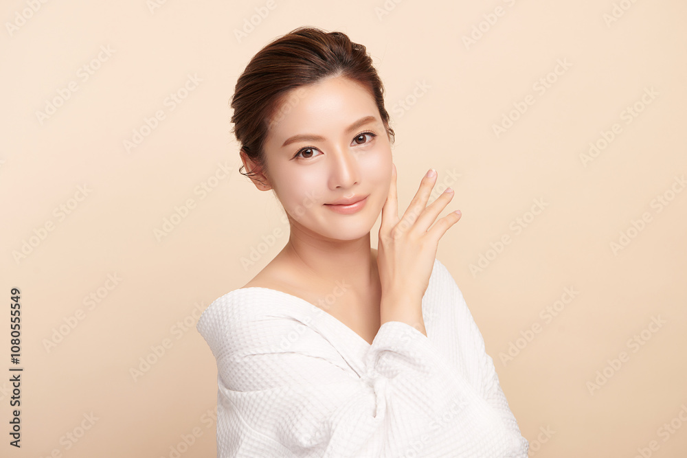 Beautiful young asian woman with clean fresh skin on beige background, Face care, Facial treatment, Cosmetology, beauty and spa, Asian women portrait. Beautiful young asian woman with clean fresh skin on beige background, Face care, Facial treatment, Cosmetology, beauty and spa, Asian women portrait.