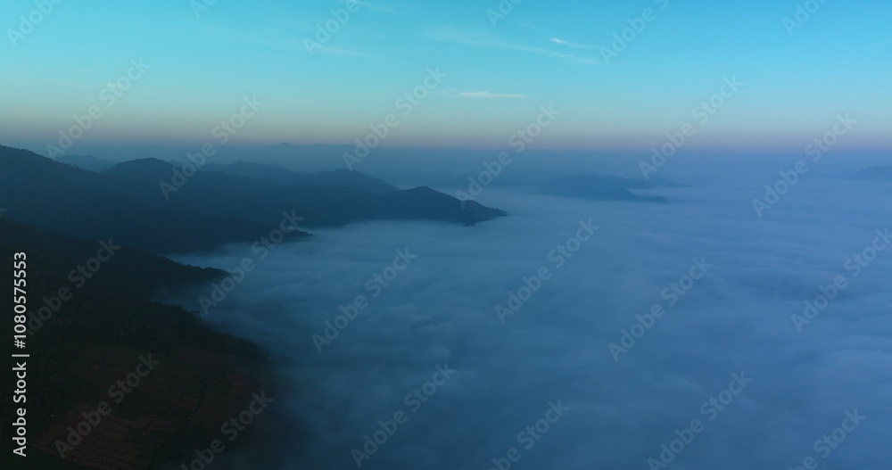 The sea of mist flowing over the mountains The sea of mist flowing over the mountains
