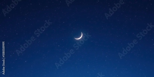 Deep blue evening sky with hundreds of twinkling stars and a crescent moon shining bright, cosmos, dark blue