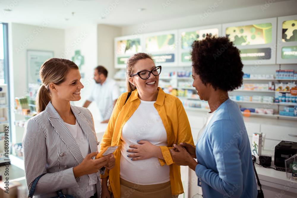Pregnant woman browsing shelves with friends at pharmacy drug store Pregnant woman browsing shelves with friends at pharmacy drug store