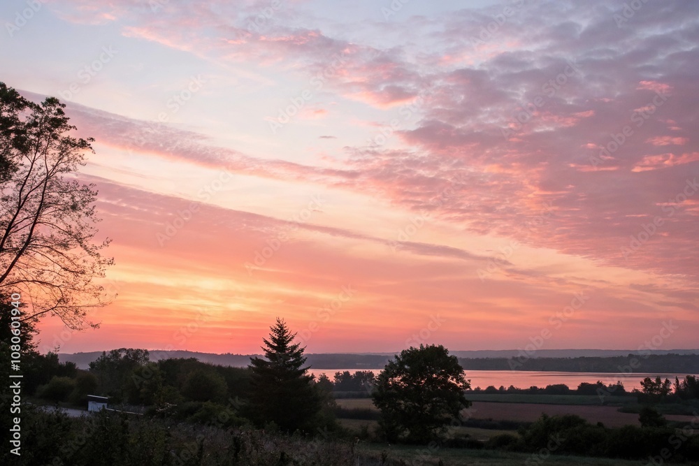 soft pink and orange hues blend with the setting sun, joyful, sunset, peaceful landscape, sky, rustic soft pink and orange hues blend with the setting sun, joyful, sunset, peaceful landscape, sky, rustic