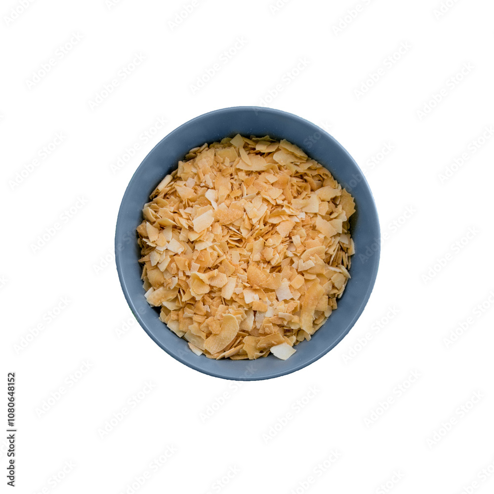bowl of dried coconut chips flakes raw bowl of dried coconut chips flakes raw