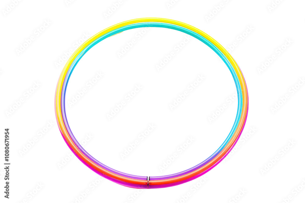 Hula hoop with alternating color segments in a coiled position isolated on white background Hula hoop with alternating color segments in a coiled position isolated on white background