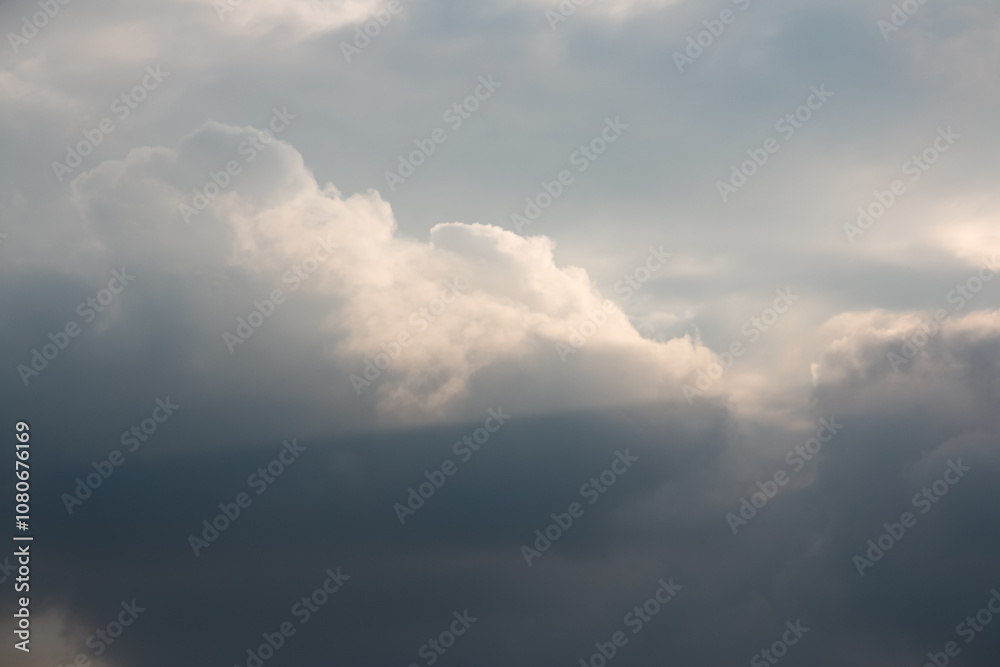 Obraz premium sky and clouds, Dramatic cloudy sky with rays in the background