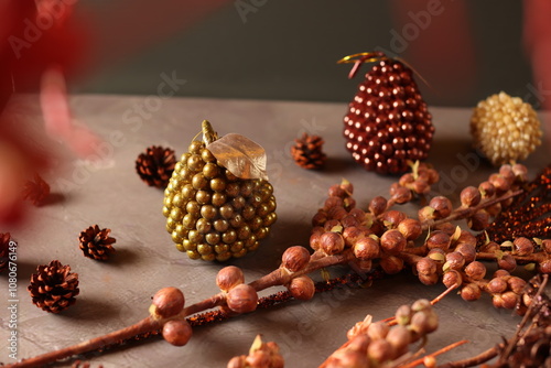 Cozy autumn decor with candles, pinecones, and berries, creating a rustic, seasonal ambiance perfect for fall. photo