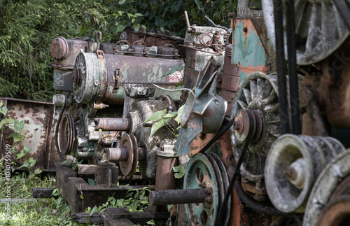 Old machine made of steel and used in the mining industry. Broken and rustic machine left over in abandon, Rusty metal old machine in abandoned outdoor, Space for text, Selective focus