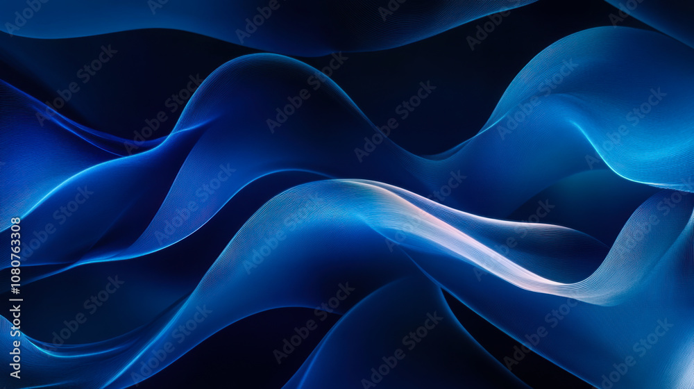 Fototapeta premium Smooth flowing dark blue fabric draping elegantly in soft light, showcasing texture and depth