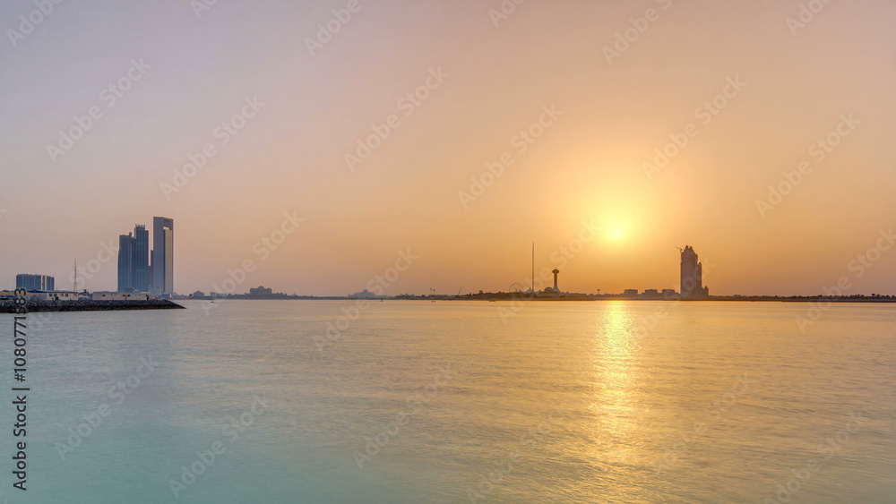 Obraz premium Sunset in Abu Dhabi over Marina Island timelapse