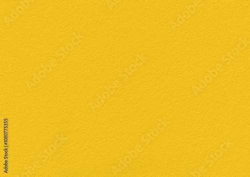 Yellow textured wall background with a smooth and vibrant surface