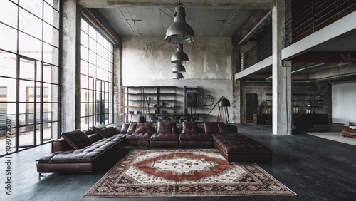 Industrial Loft with Large Leather Sectional Sofa and Vintage Rug