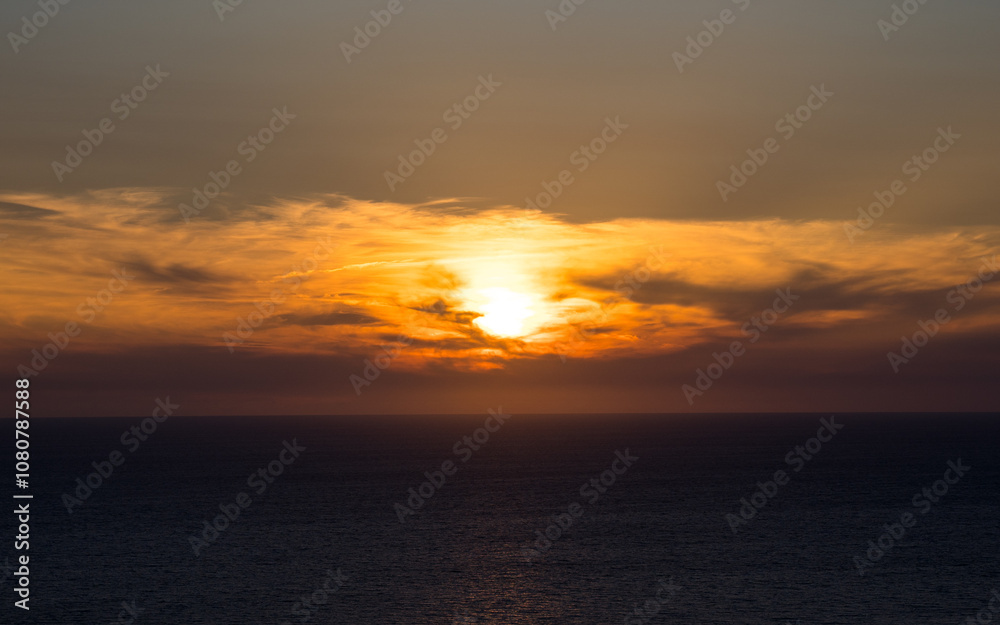 Cliff-top sunset on the Greek island of Zakynthos Cliff-top sunset on the Greek island of Zakynthos
