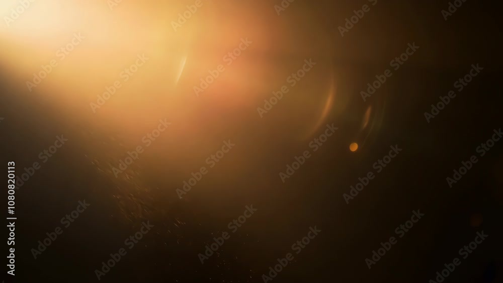 Play of golden sunlight with dramatic lens flare creates ethereal atmospheric background. Warm amber and sepia tones produce dreamlike cinematic mood. Overlay texture.
