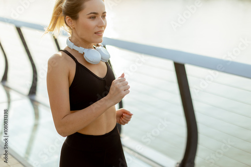 Joyful jogger enjoying a mo...