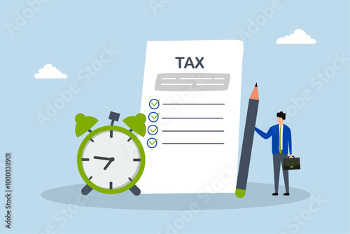 Tax time reminder, businessman grasping pencil alongside tax paperwork and a clock.