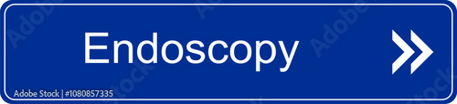 Blue and white vector graphic of a direction sign inside a hospital pointing to the endoscopy department