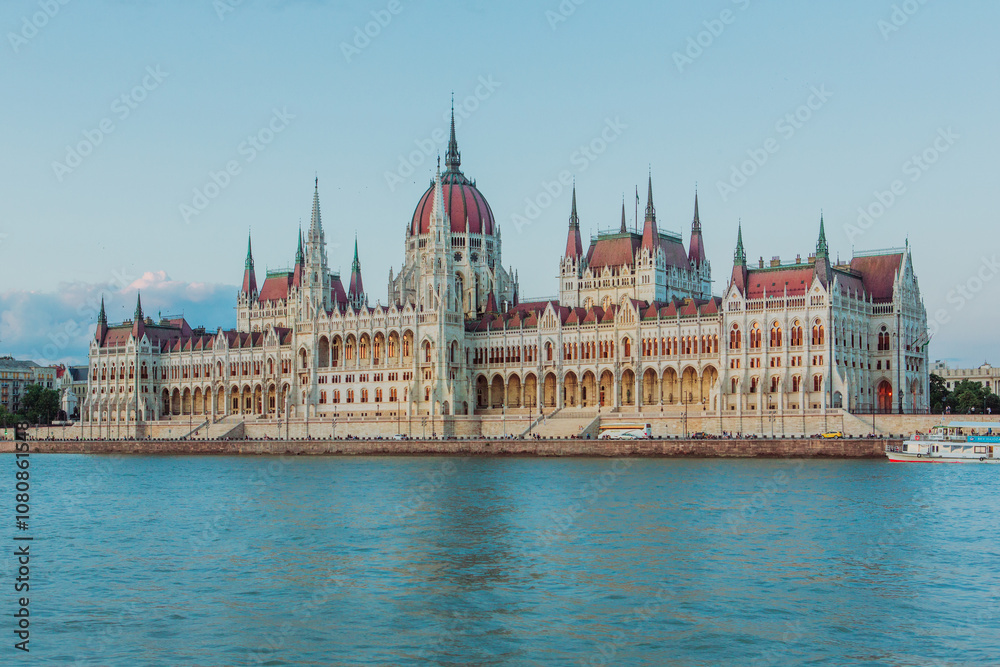 Majestic Hungarian Parliament Building with the Danube River in the Foreground: Iconic Views of Budapest's Historic Landmark Majestic Hungarian Parliament Building with the Danube River in the Foreground: Iconic Views of Budapest's Historic Landmark