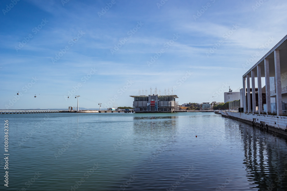 Fototapeta premium Tejo river with the Oceanarium in the background at Parque das Nações, Lisbon PORTUGAL