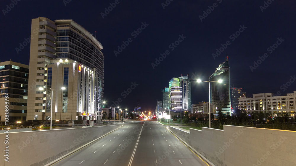 Fototapeta premium Night city traffic Kunaev Avenue timelapse hyperlapse. Astana, Kazakhstan
