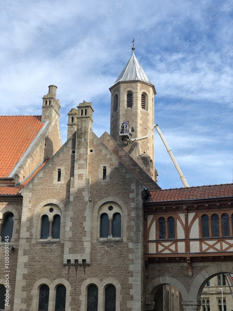 Fototapeta premium old building on the central square. tower clock repair