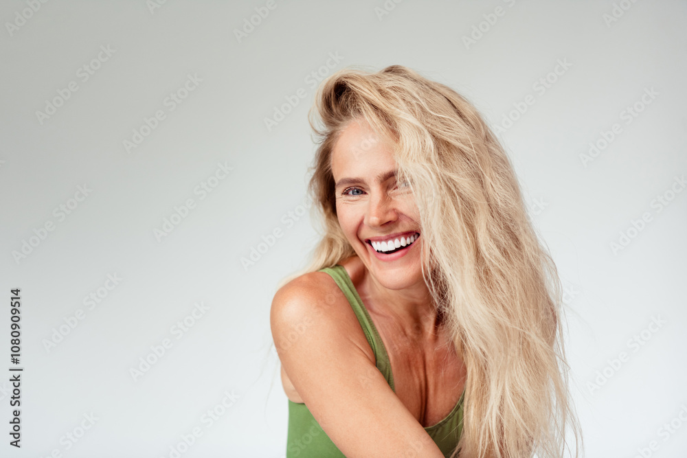 Photo of gorgeous mature blonde lady cheerful smile wear khaki lingerie isolated white background no retouch