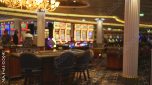 Photography Blurred view inside las vegas casino featuring defocused slot machines and people under ambient lighting with bokeh effect creating a vibrant, energetic atmosphere